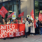 Unite members with banners and flags at the Unite conference 2025