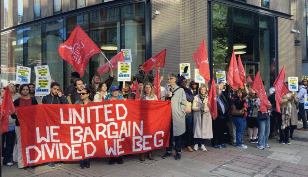 Unite members with banners and flags at the Unite conference 2025